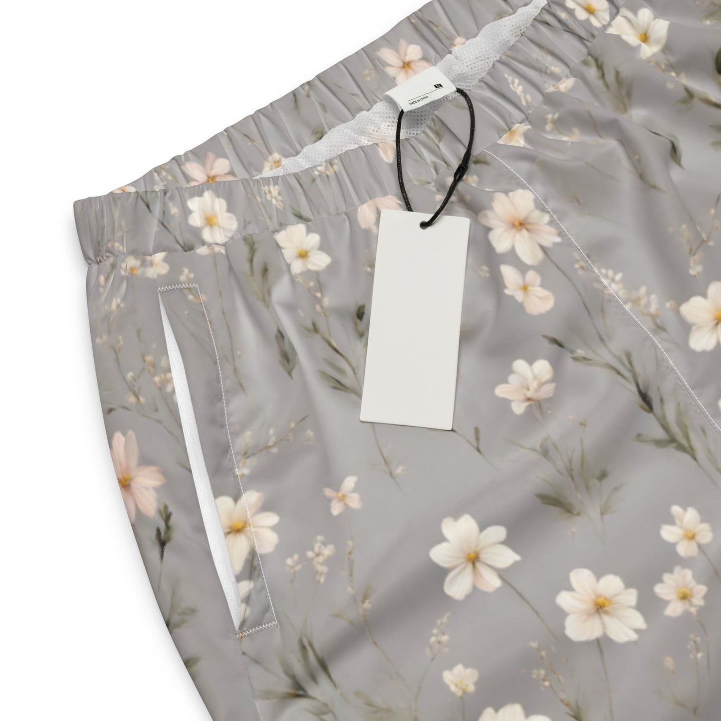 Unisex track pants Activewear Adult Tan and White flower pattern