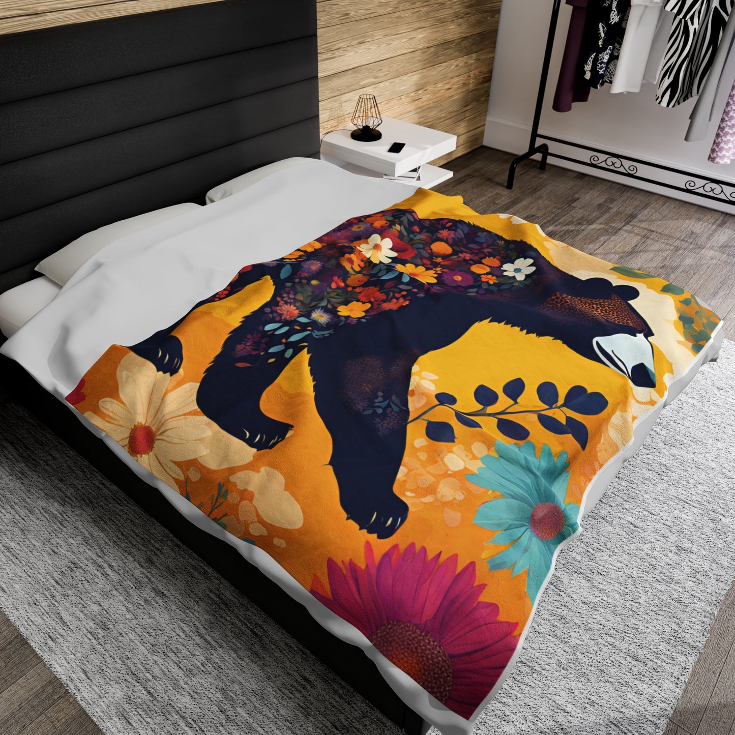 Soft and velvety plush blanket featuring a colorful image of a bear with wild flowers